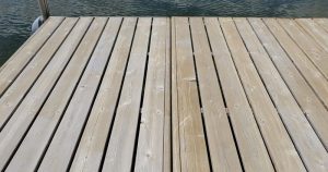 This one shows two panels that I have only rough brushed and cleaned with Behr deck cleaner, so far. The one on left had sun exposure all winter.